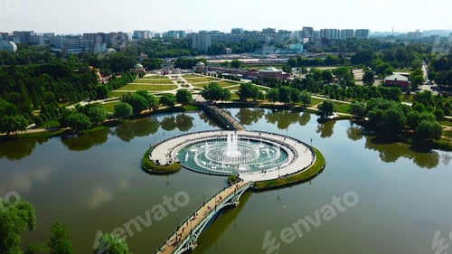 Preview: Top view of fountain in pond and historical palace. Creative. Amazing fountain in lake with