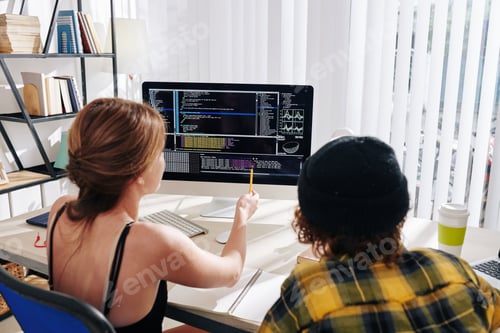 Preview: Students discussing programming code