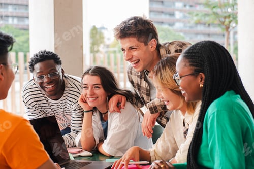 Preview: Diverse Group of College Students Collaborating on Project with a Laptop. High School Classmates