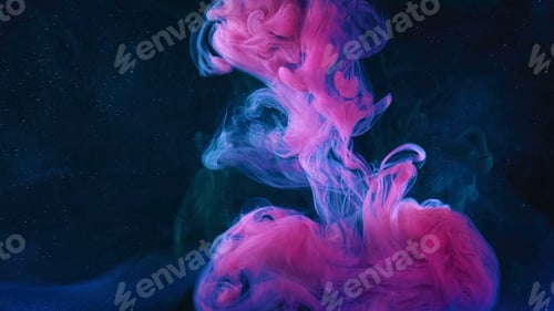 Preview: A beautiful mixture of acrylic inks in dark blue glittering water. Stock footage. Close up of pink