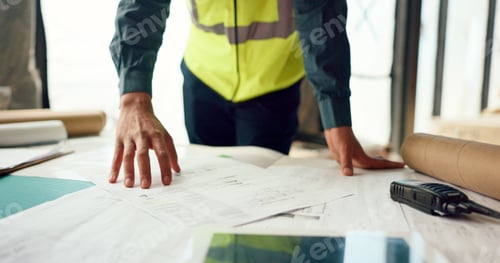 Preview: Hands of architect check blueprint at construction site for building, house or real estate industri