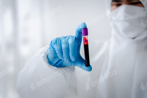 Preview: Doctor or research scientist taking blood sample tube to check data in laboratory biotechnology spec