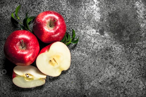 Preview: Fresh red apples. On rustic background.