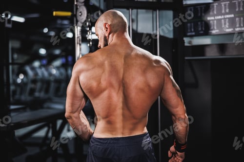 Preview: Fitness Man Showing His Muscles At The Gym