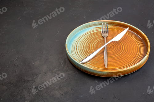 Preview: front view brown big tray with plate fork and knife on dark background table glass ceramic food