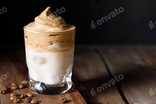 Preview: Dalgona coffee - the Korean coffee drink on wooden background.