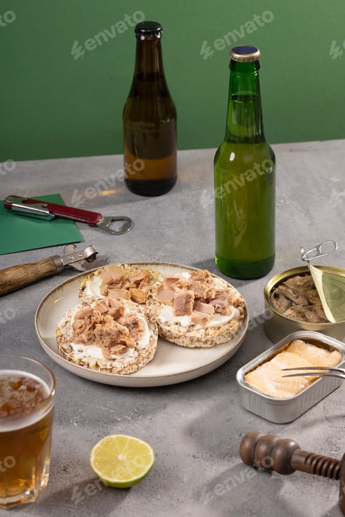 Preview: Fish Sandwiches and Beer on a Concrete Table