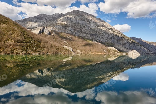 Preview: Picturesque reservoir and mountain landscape in Riano. Mirror effect. Spain