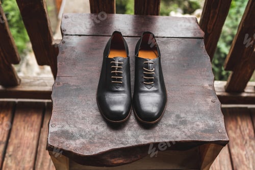 Preview: Classic dark-brown leather shoes on wooden stand