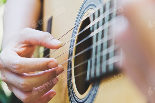 Preview: playing acoustic guitar