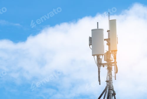 Preview: Telecommunication tower with blue sky and white clouds background. Antenna on blue sky. Radio and sa