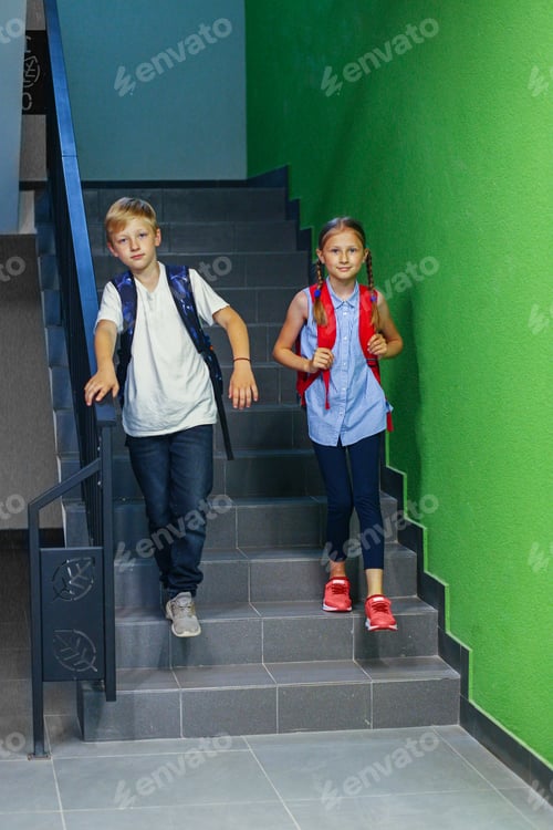 Preview: Two schoolchildren go to school, going down to front door, carrying school bag on their backs.