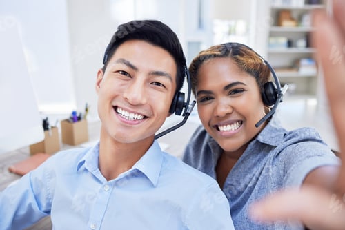 Preview: Happy and diverse call center agents or colleagues taking a selfie together at the office. Male and