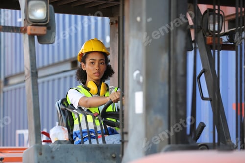 Preview: Foreman control loading Containers box from Cargo freight ship for import export.