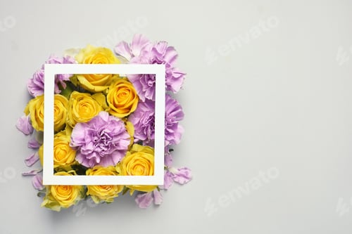 Preview: Flat lay composition with beautiful blooming flowers on grey background