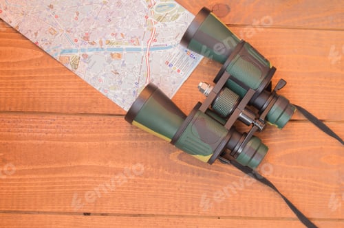 Preview: Travel planning, vacation, tourism, , binoculars and a map