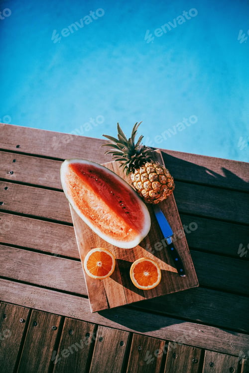 Pineapple Watermelon and Oranges by the Blue Pool