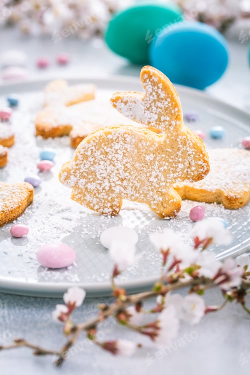 Preview: Easter bunny almond cookies and Easter eggs on decorated festive table