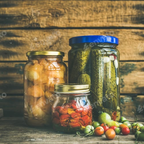Preview: Autumn pickled vegetables in glass jars, copy space, square crop
