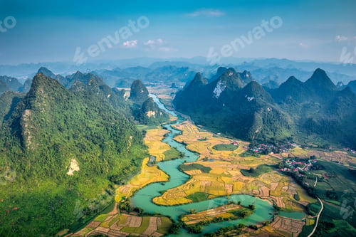 Preview: Phong Nam Valley with rice field and river flows through traditional village in countryside