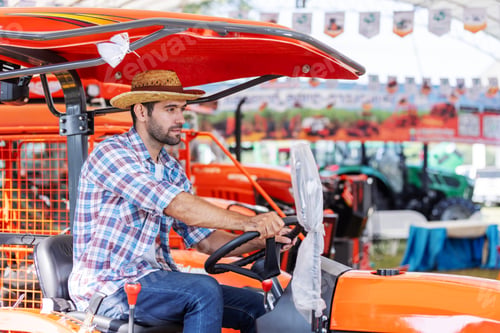 Preview: Farmers test drive vehicles at a motorcycle show