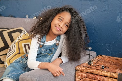 Preview: The African American Child Looks Directly Into The Camera In The Children'S Room.