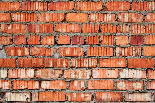Preview: Old brick red wall, brickwork from an old brick in rustic style. Structure and pattern of destroyed