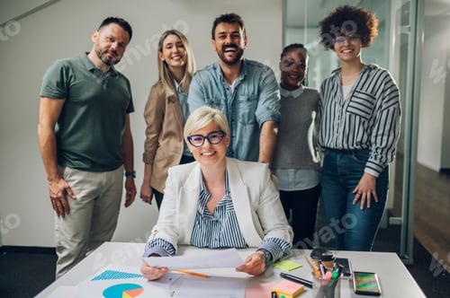 Preview: Multiracial business team on a meeting in a modern bright office