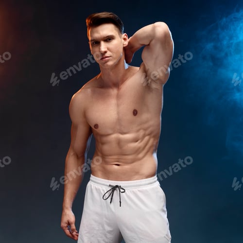 Preview: Strong athletic man fitness model showing his perfect body isolated