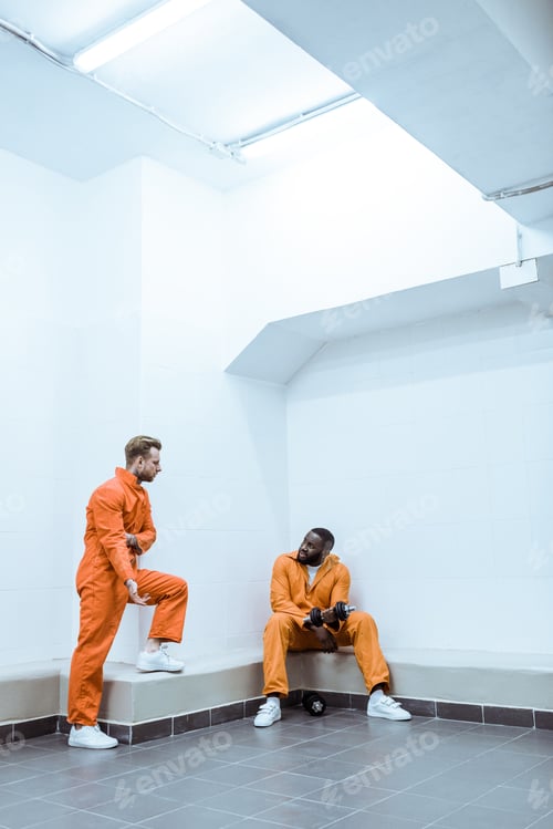 Preview: multiethnic prisoners in light modern prison cell