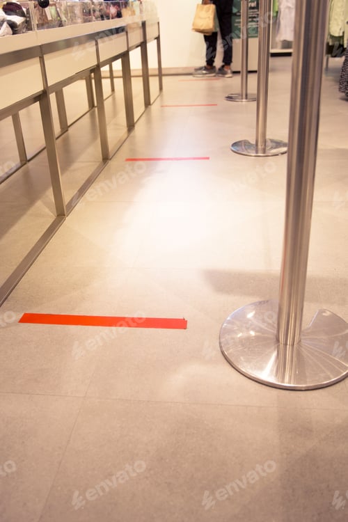 Preview: The red tape stick on the floor as a practicing of the Social Distance