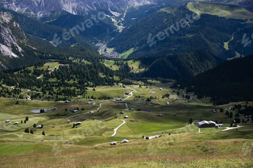 Preview: Mountain huts with the beautiful mountainous landscape of Val Gardena in Dolomites.