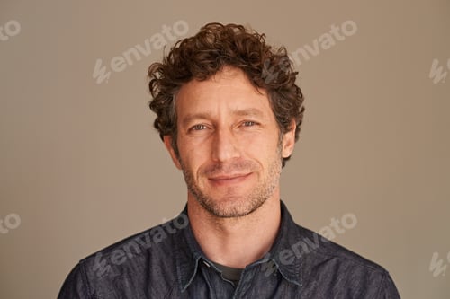 Preview: Hes the modern man. Portrait of a handsome young man in the studio.