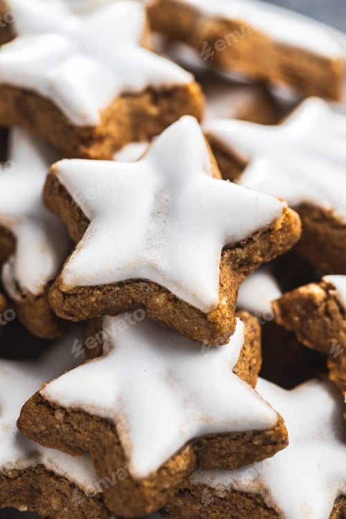 Preview: Icing gingerbread stars. Traditional Christmas cookies.