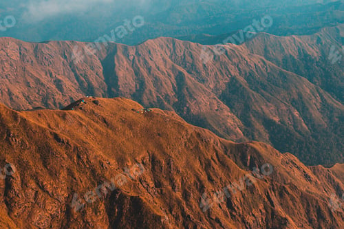 Preview: Top View Mulayit Taung golden light of the morning sun and the mist covered on Mount Mulayit,Myanmar
