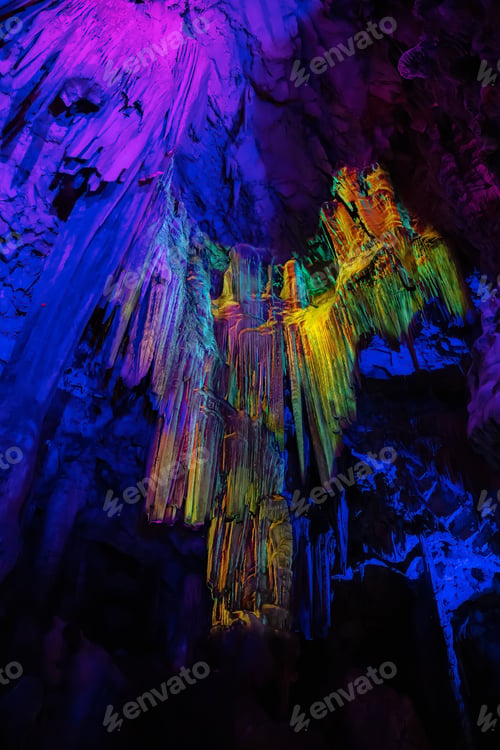 Preview: Saint Michael's Cave with colorful lights and Angel. Natural Rock Formation. Gibraltar