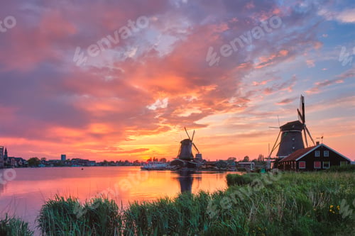 Preview: Windmills at Zaanse Schans in Holland on sunset. Zaandam, Nether