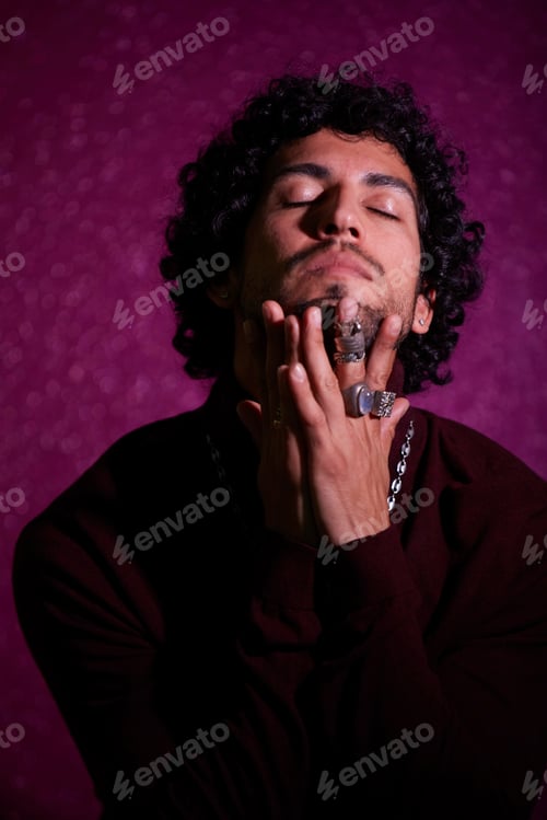 Preview: Studio portrait of mid adult man being sensual