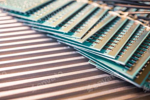 Preview: Close-up side view of a panel of SMD resistors