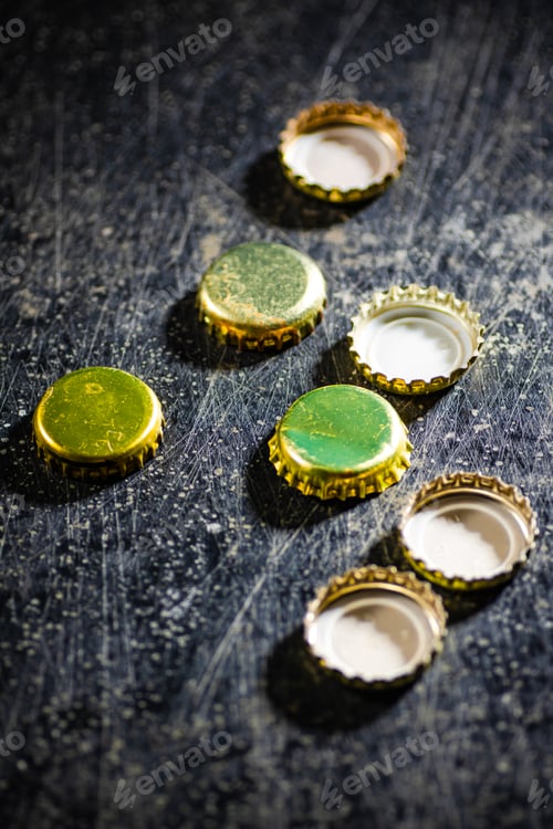 Preview: Several beer bottle caps.
