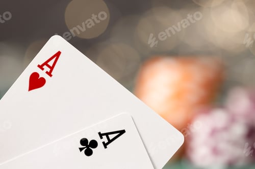 Preview: Playing cards on poker table background close up