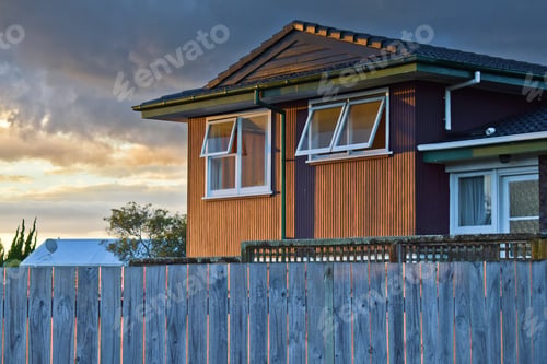 Preview: Closeup of a suburban house in Maclean's college zone in sunset light