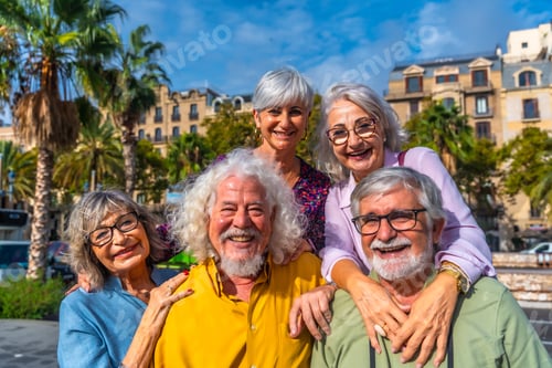 Preview: Cheerful senior friends enjoying city travel and retirement