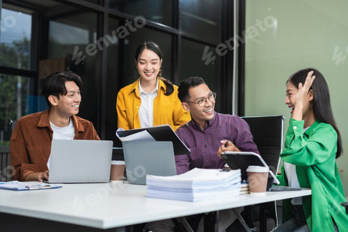 Preview: Group of Young Asian business team creative businesspeople coworker in office