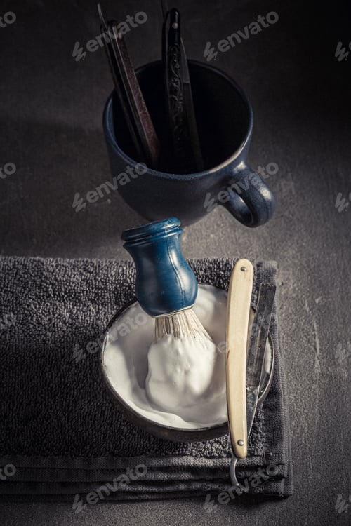Preview: Unique and classic barber equipment with razor and brush.