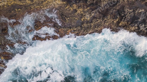 Preview: Atlantic ocean with strong swell beating against the walls of a rocky cliff in south of Tenerife