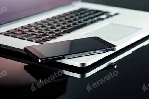 Preview: Smartphone and laptop.