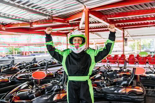 Preview: Triumphant Racer Celebrates Victory in Go-Kart Arena