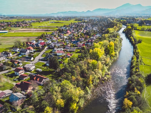 Preview: River running trough the suburb community aerial view