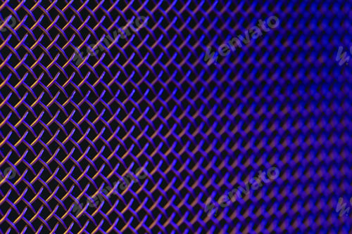 Preview: Metal grill close-up, texture of a music speaker in colored lighting.